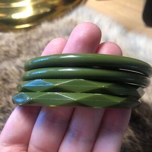 Set of four natural green lucite bangle bracelets